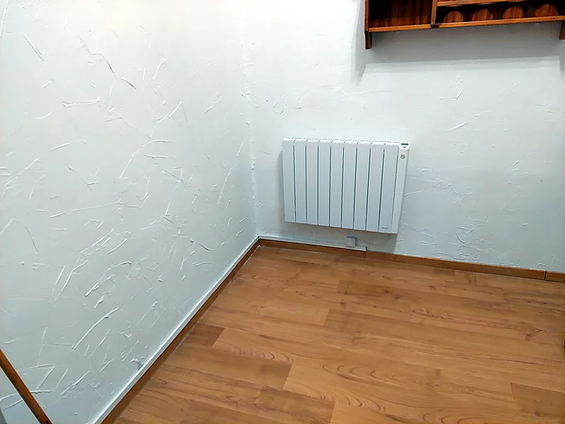 Pose d'un radiateur électrique à inertie